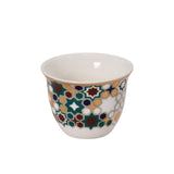 CASA BLU 13-piece tea and Arabic coffee set in a black foam-lined gift box. The set includes six glass tea cups and six porcelain coffee cups featuring a colorful green, red, and blue geometric mosaic pattern with gold accents.