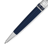 Dark blue ballpoint pen with a silver-toned tip. The blue barrel has two subtle grooves, and a silver-toned band features a b