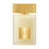 Frosted white Tom Ford Eau de Soleil Blanc perfume bottle with a gold-toned ribbed cap and a gold-toned label.