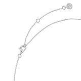 Silver-toned delicate link necklace with a lobster clasp, extender chain, and a small round clear stone in a bezel setting.