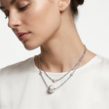 Cerruti 1881 Luciana layered silver necklace displayed on a minimal textured prop to show the scale, drop length, and layered hanging style of the chains.