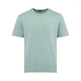 Light green short-sleeved crew neck T-shirt with a small embroidered logo on the left chest.