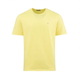 Light yellow short-sleeved crew neck t-shirt with a small dark 'CNC' logo on the left chest.