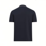 Dark blue short-sleeved polo shirt with a collar and sleeve cuffs featuring thin light beige stripes. Back view.