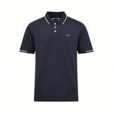 Dark blue short-sleeved pique knit polo shirt with white striped ribbed collar and cuffs, and white buttons.