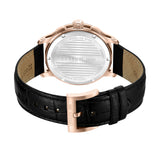 Rose-gold-toned watch with a silver-toned stainless steel back and a black textured strap with a rose-gold-toned buckle.