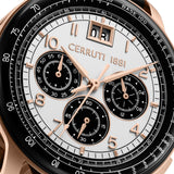 Rose gold-toned watch with a black bezel, white dial, rose gold-toned hands and markers, three black sub-dials, and a date wi