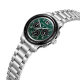 Silver-toned metal watch with a round case, black bezel, green dial, three black subdials, and a date window. Metal link brac