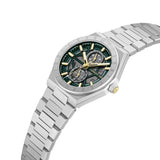 Silver-toned metal watch with a faceted case and link bracelet. It features a green skeleton dial with gold-toned hands, mark