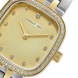 Gold-toned watch with a rectangular case, crystal-lined bezel, textured beige dial with blue crystal markers, and two-toned b