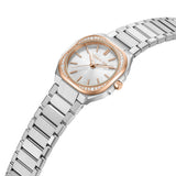 Silver-toned metal watch with an octagonal case. Rose-gold-toned bezel with clear stones, silver dial, rose-gold-toned hands