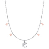 Silver-toned steel necklace with rose gold-toned star charms and a moon pendant featuring a white zircon.