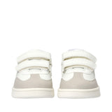Pair of low-cut sneakers with white uppers, light grey toe and side panels, and three white velcro straps on each.