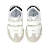 Pair of white faux leather low-cut sneakers with two velcro straps. Light grey suede-like toe and side panels, black heel tri