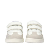 Pair of low-cut sneakers with white uppers, light grey suede panels, and three white velcro straps on each shoe.