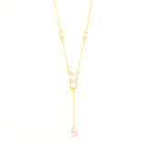 Gold-toned lariat necklace with a fine chain and five clear, brilliant-cut stones, including a central drop design.