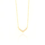 Gold-toned fine link chain necklace with a curved pendant featuring clear rectangular and round-cut stones.