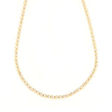 Gold-toned tennis necklace with clear faceted stones