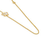 Gold-toned long necklace with a butterfly pendant featuring white mother-of-pearl wings and sparkling stones.