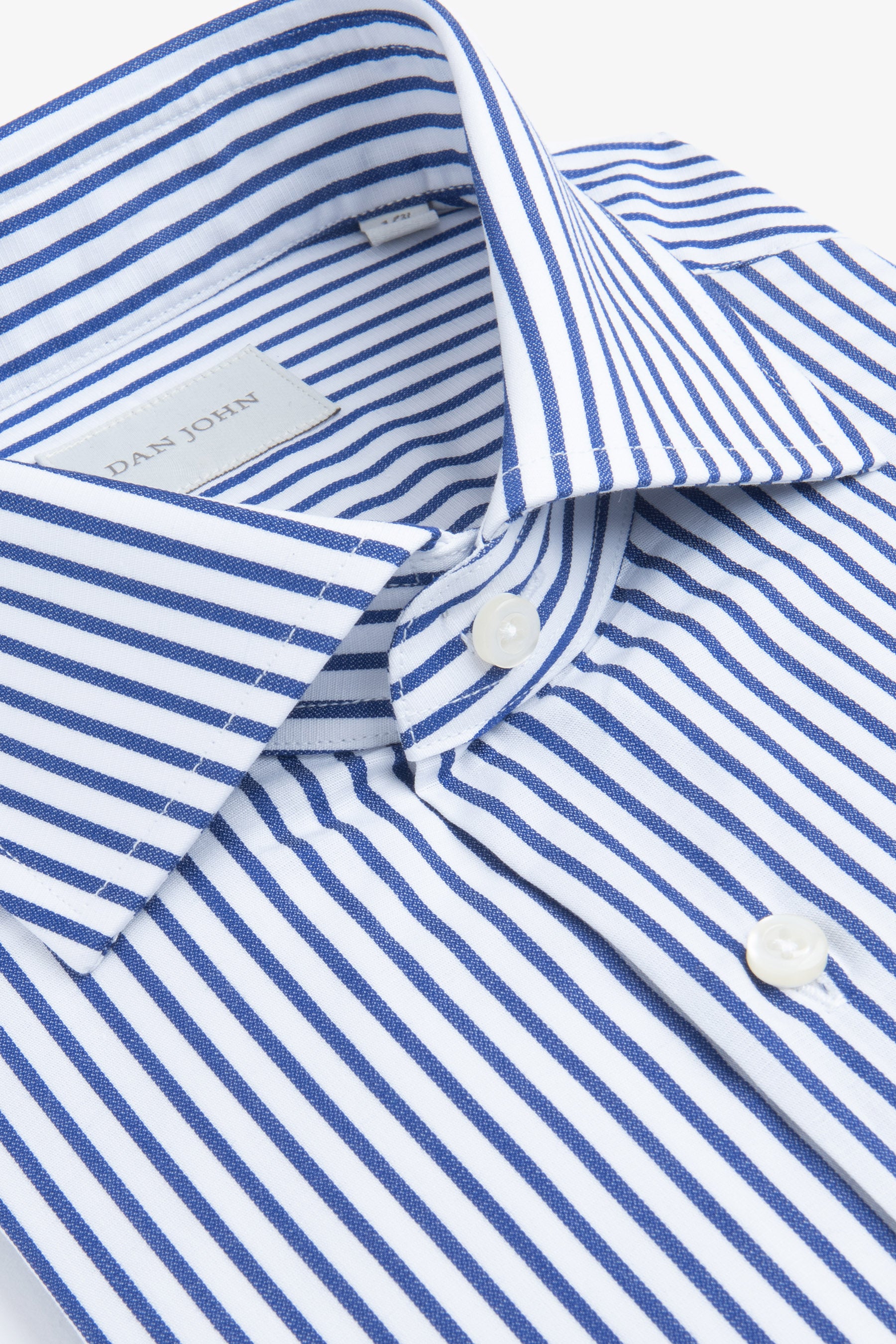 White shirt with thin royal blue vertical stripes, a classic collar, and white buttons.