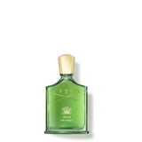 A translucent green glass bottle of Creed Wild Vetiver perfume with a gold cap, featuring the embossed Creed logo and gold lettering against a white background.