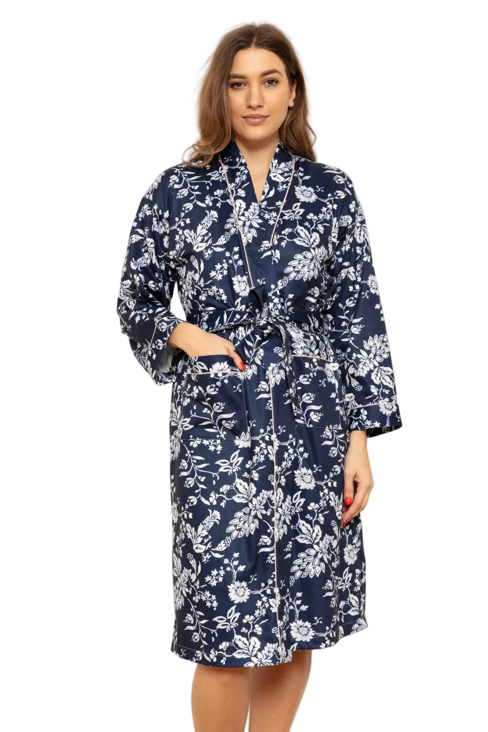 Midnight blue cottonfleece kimono wrapover with white floral pattern, self-tie belt, patch pockets, and light pink piping.