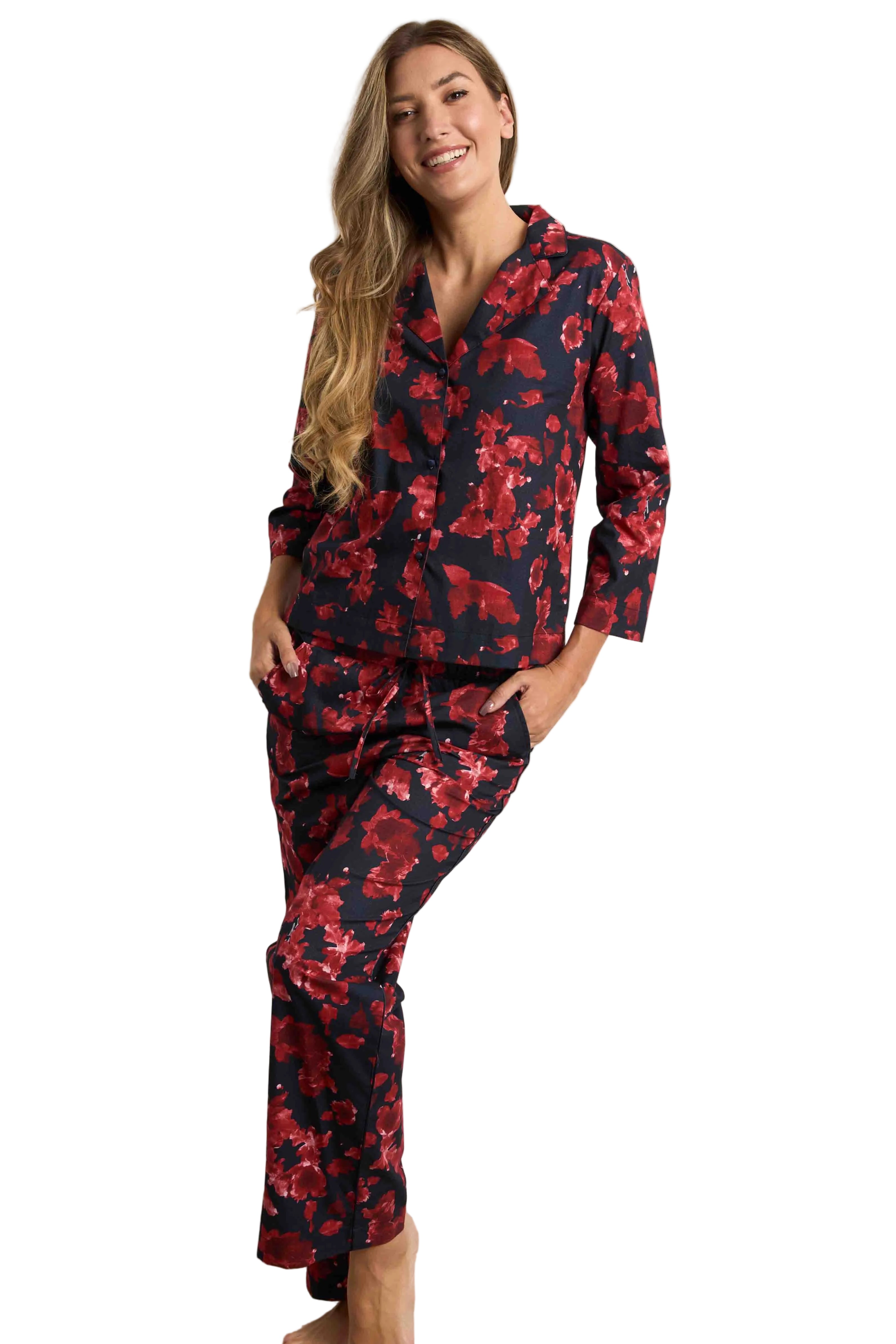 Crimson red and navy twillpoplin pyjama set with an abstract floral pattern, featuring a button-front shirt and trousers with