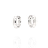 A pair of polished silver-toned hoop earrings, one with "S925" and the other with "2852" engraved on the inner surface.