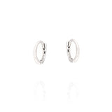 Pair of small, polished silver-toned hoop earrings with a hinge closure, each stamped 'S925'.