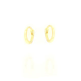 Pair of small, polished gold-toned 6mm hoop earrings with a hinged closure and S925 marking on the inner surface.