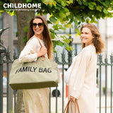 Large kaki canvas tote bag with 'FAMILY BAG' in black text, brown handles, gold-toned hardware, and a small brown Childhome l