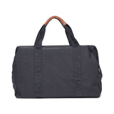 Dark grey Childhome Mommy Bag duffel with brown faux leather top handles and embossed 'MOMMY BAG' text on straps.