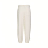 Back view of Citizens of Humanity beige jogger pants showing the relaxed fit, elastic waistband, gathered cuffs, and a single right-side rear patch pocket against a white background.