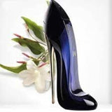 Carolina Herrera Goodgirl EDP- 80ml Black high-heeled shoe with a flower on a white background