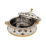 Casa Blu luxury white insulated food warmer with gold-plated base and handles, decorated with black and gold geometric sunburst patterns on the body and lid.