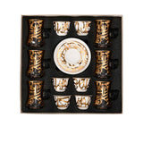 CASA BLU 13-piece luxury coffee and tea set featuring gold Arabic calligraphy on white porcelain cawa cups and smoke-tinted tea glasses, presented in a black gift box.
