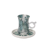 Top-down view of an 18-piece Casa Blu luxury drinkware set in a presentation box, featuring 6 tea glasses, 6 Cawa cups, and 6 saucers with a teal Lily of the Valley floral pattern.