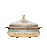 Casa Blu insulated food warmer featuring an intricate cream and gold floral pattern with a turquoise horizontal band, gold-plated base, handles, and lid finial.