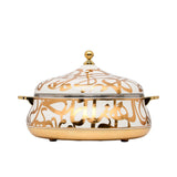 Casa Blu luxury insulated casserole dish featuring gold calligraphic script on a white background with gold handles and a domed lid.