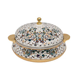 Casa Blu insulated food warmer with a white body covered in a multicolor geometric star mosaic pattern, featuring gold-plated handles and base.