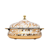Casa Blu luxury insulated casserole dish featuring gold calligraphic script on a white background with gold handles and a domed lid.
