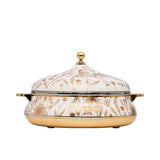 A luxury white and gold insulated food warmer by Casa Blu, featuring gold-etched horse and floral patterns, gold handles, and a decorative lid knob.