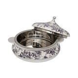 Casa Blu insulated food warmer featuring a black and white vintage floral and leaf pattern with polished silver-tone handles and a round lid knob.