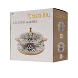 A luxury white and gold insulated food warmer by Casa Blu, featuring gold-etched horse and floral patterns, gold handles, and a decorative lid knob.