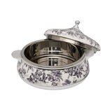 Casa Blu insulated food warmer featuring a black and white vintage floral and leaf pattern with polished silver-tone handles and a round lid knob.