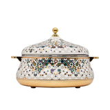 Casa Blu insulated food warmer with a white body covered in a multicolor geometric star mosaic pattern, featuring gold-plated handles and base.