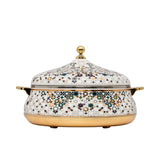 Casa Blu insulated food warmer with a white body covered in a multicolor geometric star mosaic pattern, featuring gold-plated handles and base.