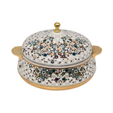 Casa Blu insulated food warmer with a white body covered in a multicolor geometric star mosaic pattern, featuring gold-plated handles and base.