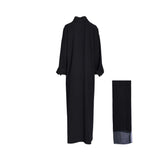 Rear view of the black lace collar abaya showing the fluid drape and elegant high-neck lace finish.