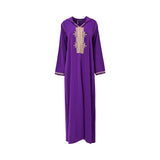 Front view of a CASA JOHARA FASHION royal purple Djellaba featuring elaborate gold embroidery on the chest and sleeves.